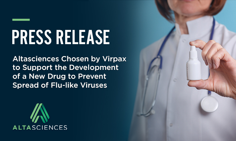 Press Release | Scientist holding a nasal spray