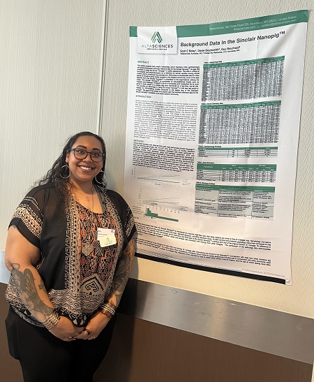 The “Background Data in the Sinclair Nanopig™ Poster” and presenter, Shanté Jackson.