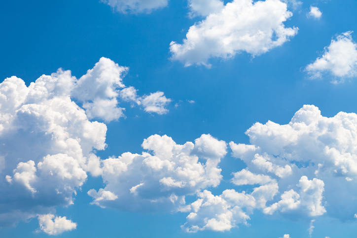 fluffy blue clouds in the sky