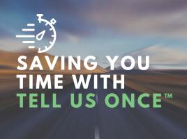 Open road with the words "Saving You Time With Tell Us Once" written across in white and green.